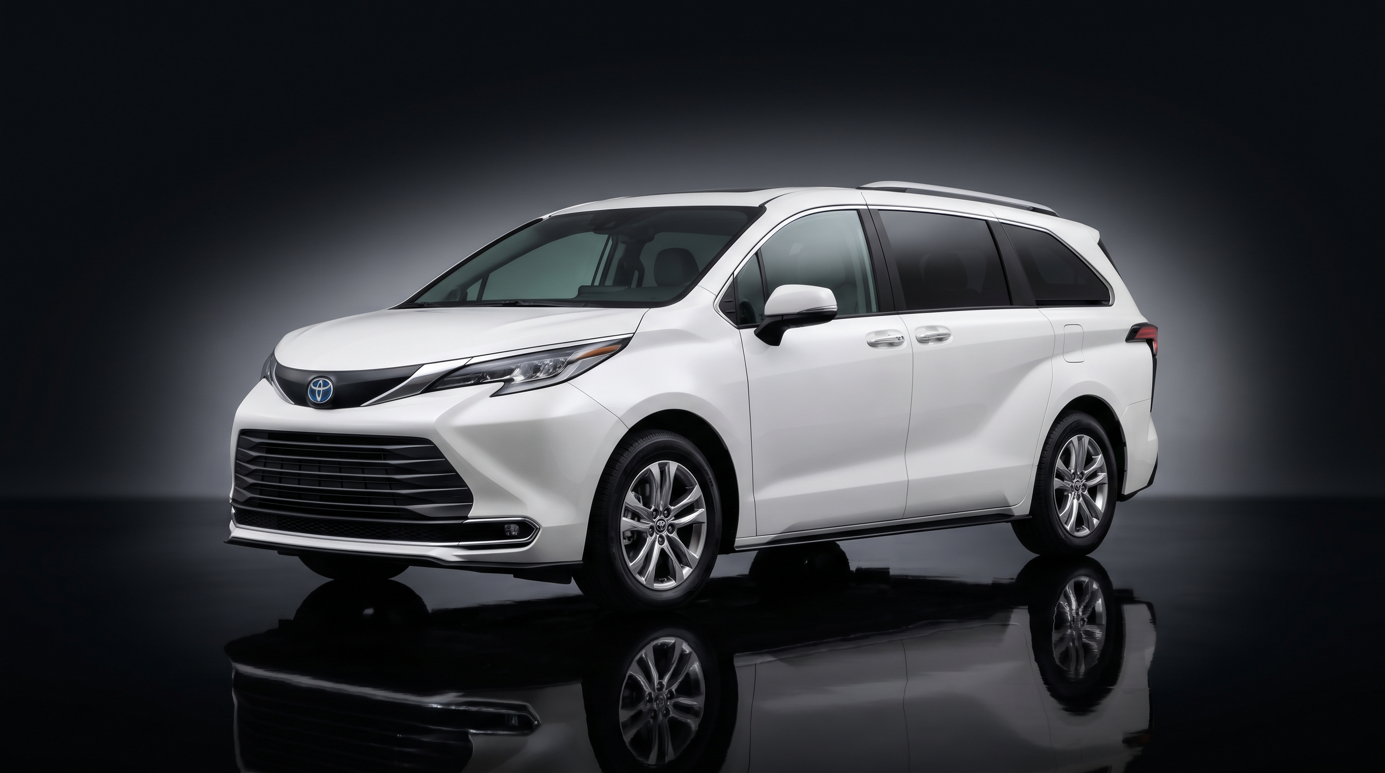 White passenger minivan in studio