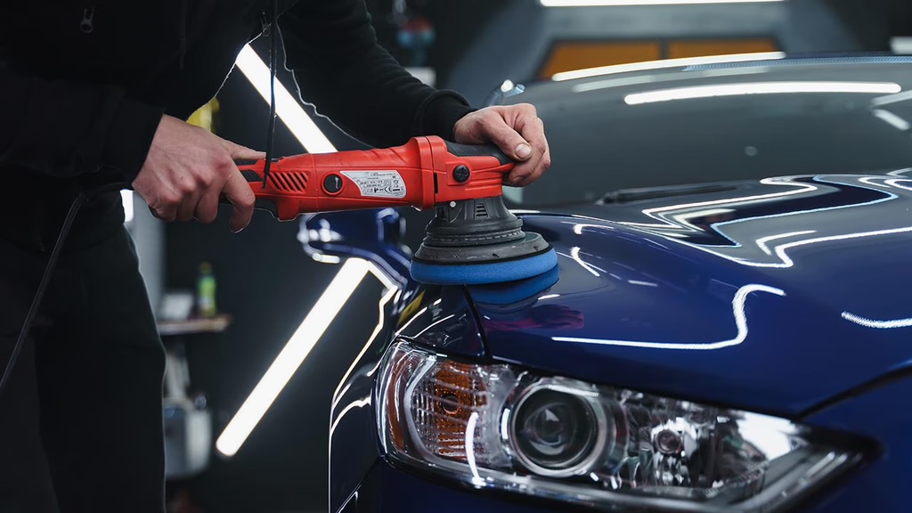 Machine polishing a car