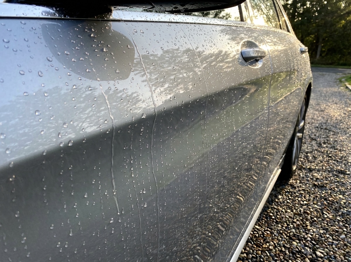 Water sheeting off coated paint